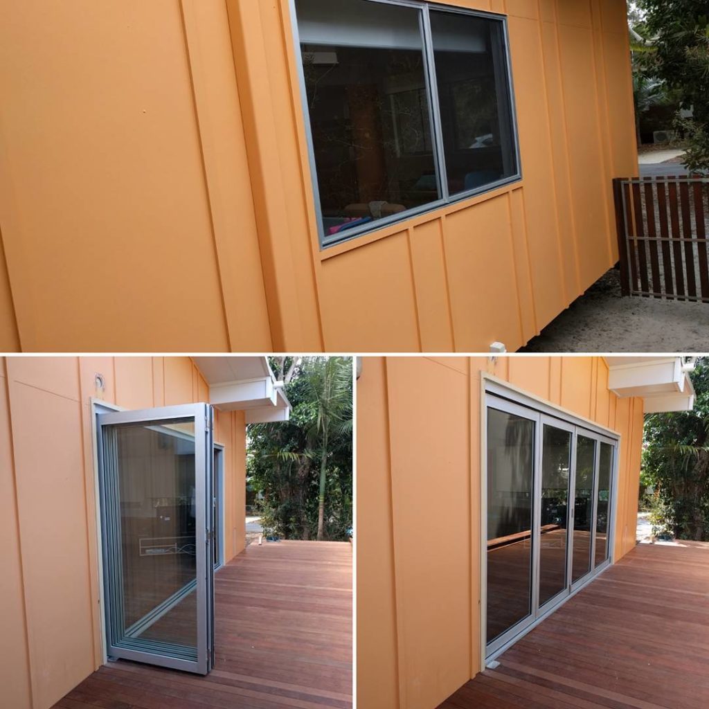Before and after photos at North Stradbroke Island showing existing sliding window before and installed four panel clear anodised bifold doors